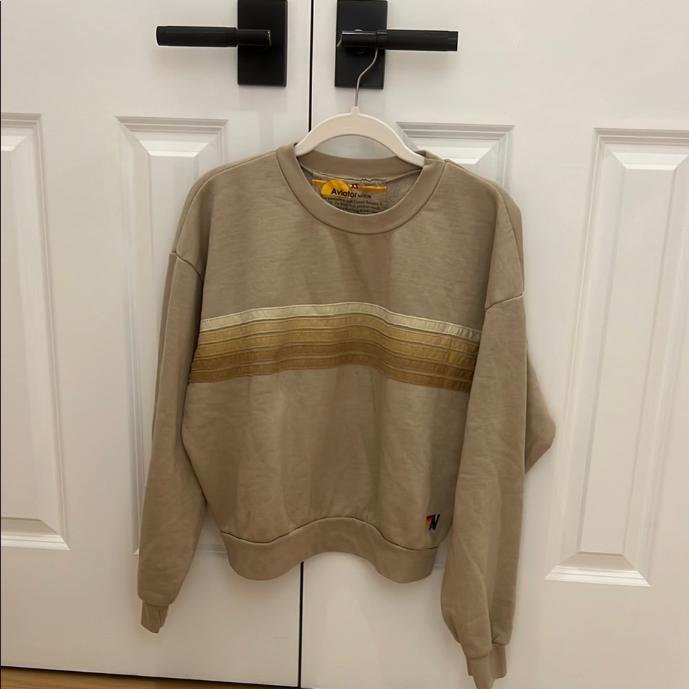 Neutral colored aviator sweater
